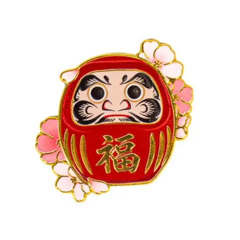 Japanilainen metallinen Daruma- ja Sakura-magneetti