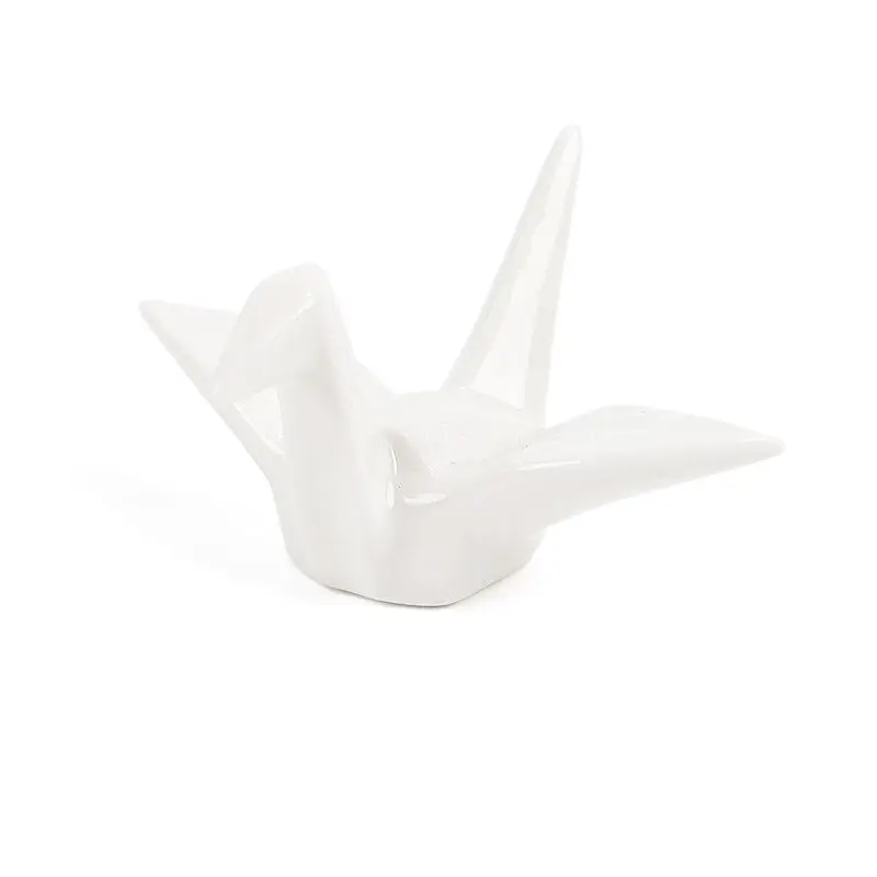 Origami White syömäpuikot lepää